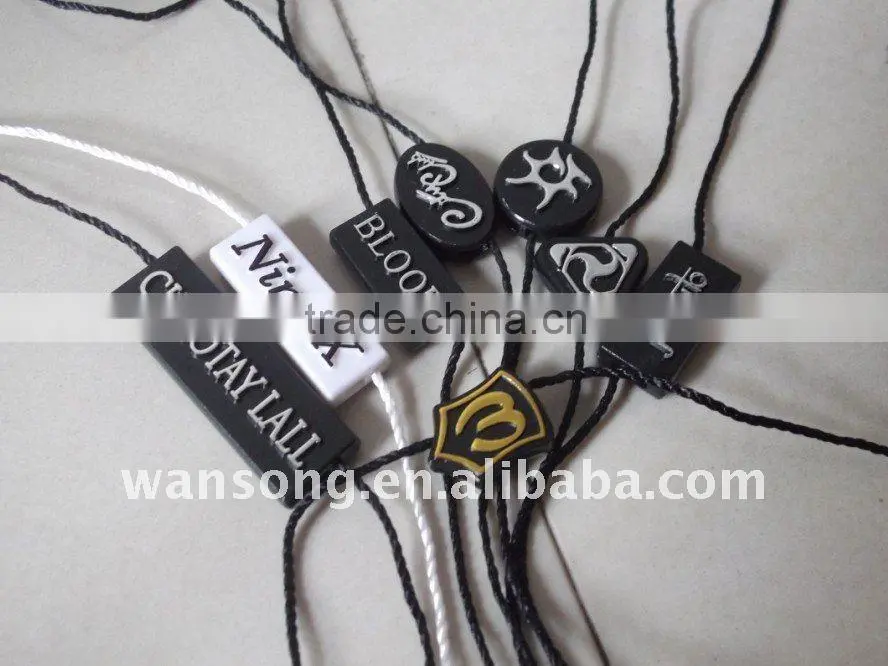 Factory custom black plastic hang tag/string seal with logo printing for sale