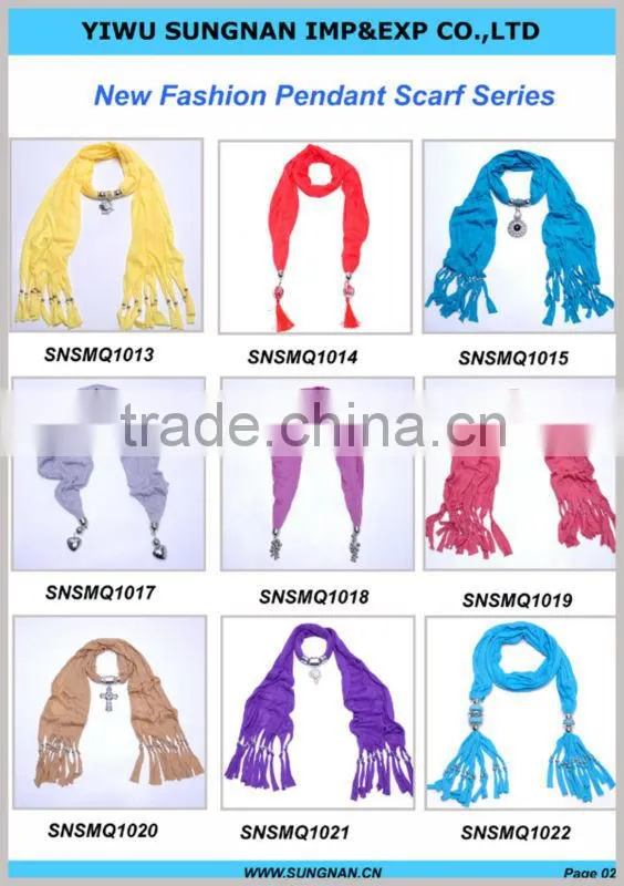 Women adorn article scarf with jewelry