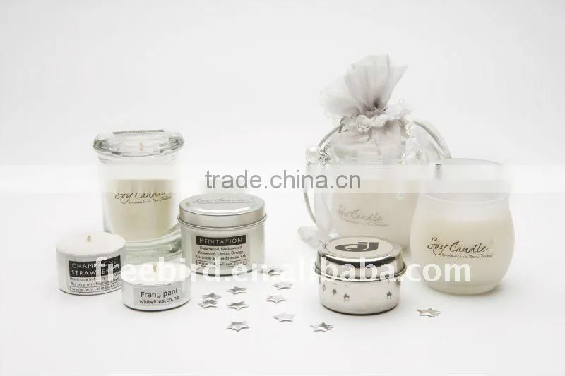 Scented Soy Candle in green & blue glass jar