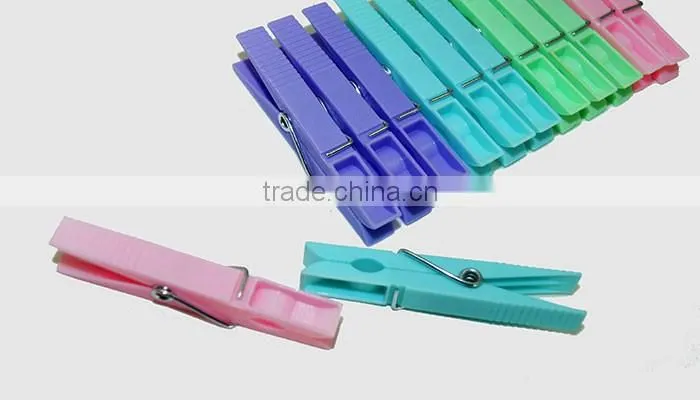 used household items hanging colored plastic peg for cloths
