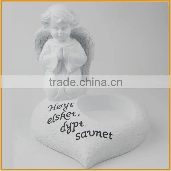 Resin angel with candle holder