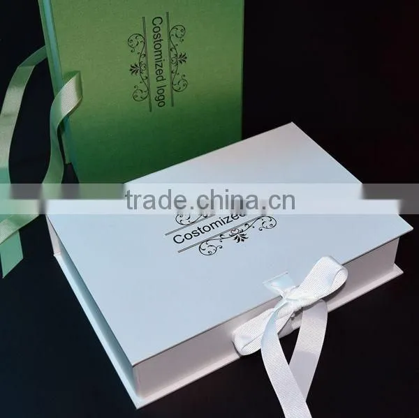 folded rigid cardboard gift boxes with bow tie closure