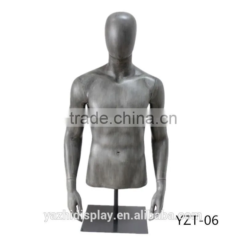 Displaying fiberglass half body male and female mannequin torso
