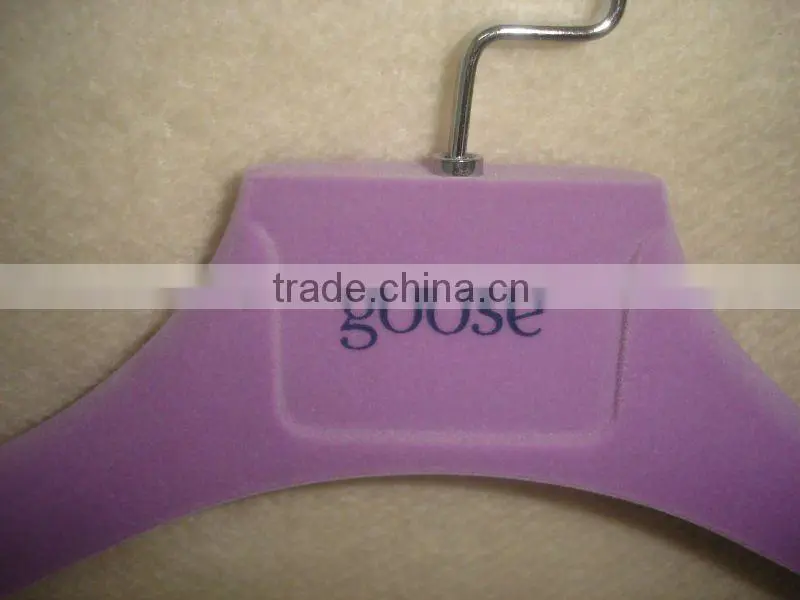 Purple velvet coat hanger for woman clothes with logo