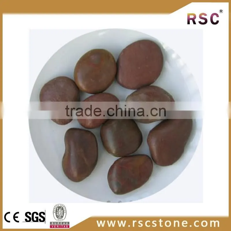 Red glow in the dark pebble stone