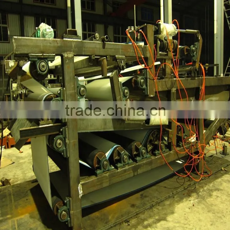 High efficiency sludge dewatering belt press