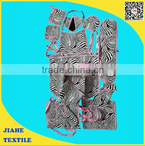 zebra-stripe set of kitchen items, apron ovenmitt and hat potholder