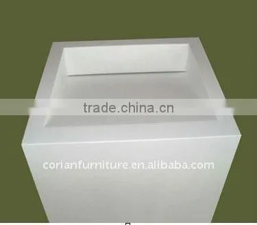 One piece shaped Corian free standing basin