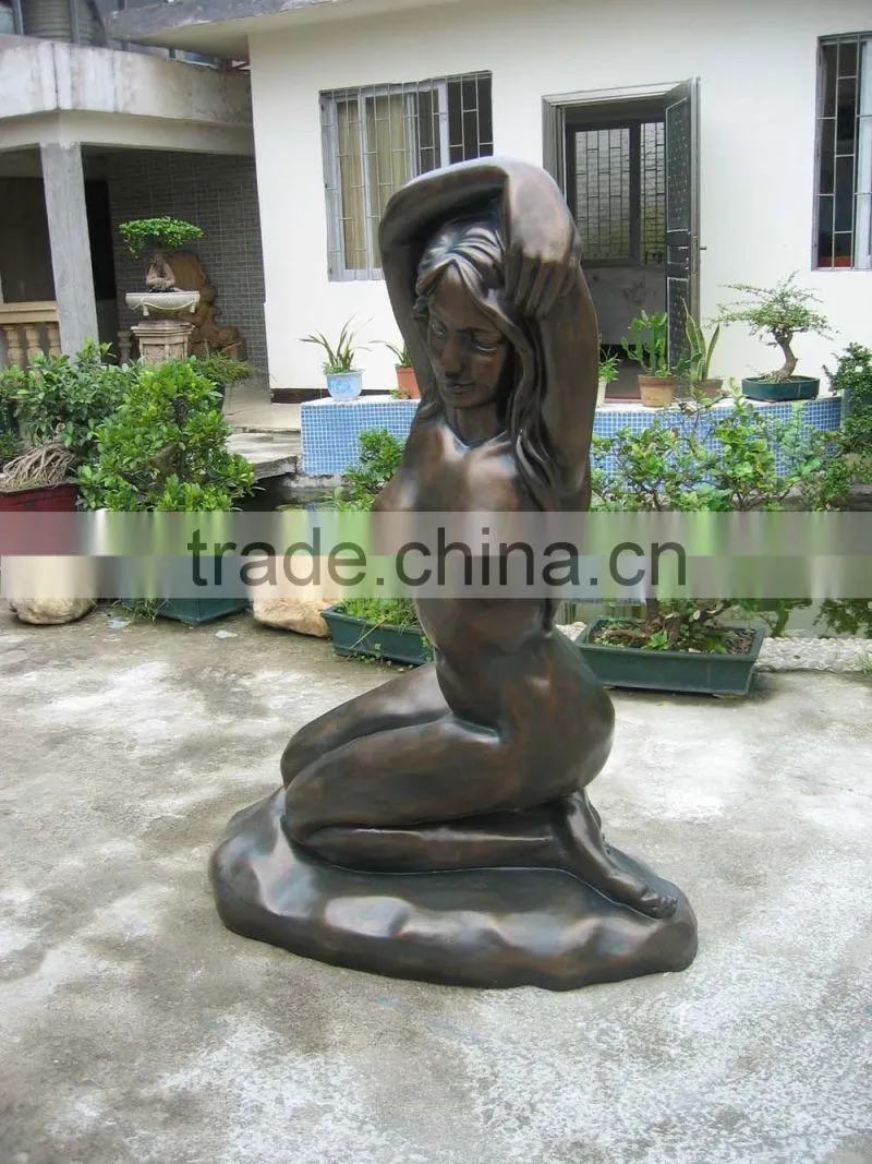 Fiberglass park lady sculpture