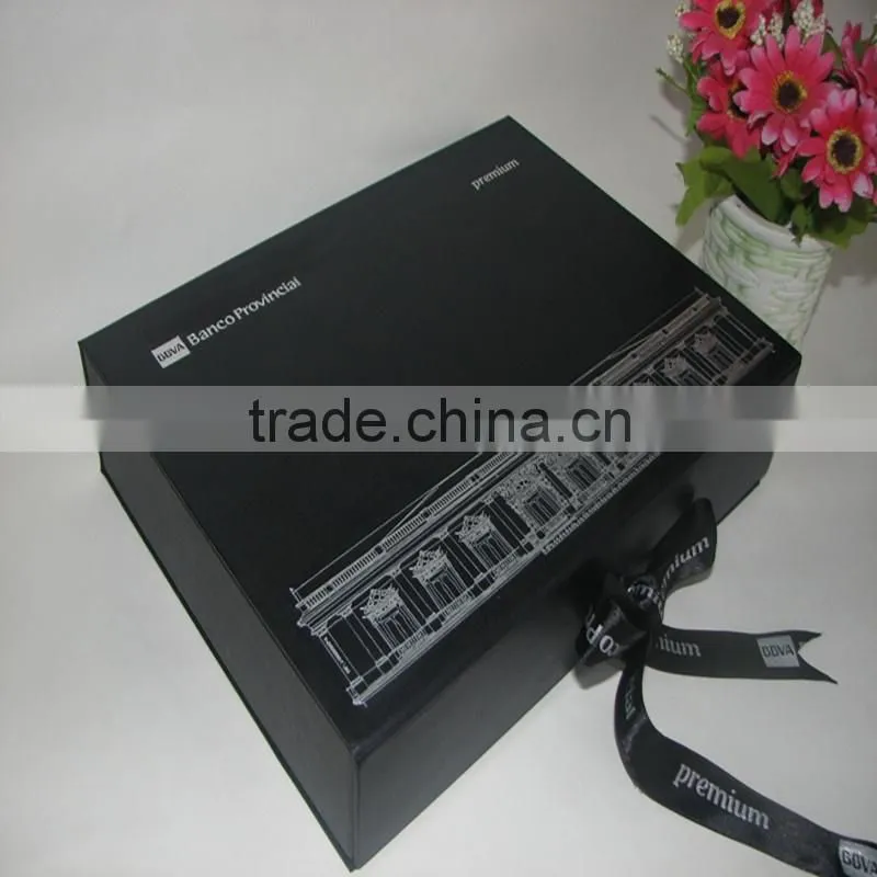 black box with CMYK printing and gold logo lamination and ribbon