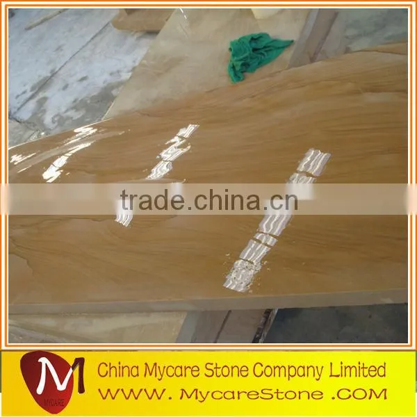 Polished sandstone paving