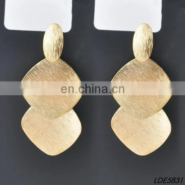 gold ring with elephant earring