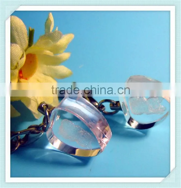 Promotional 3D engraving crystal keychain with led light as kids led giveaway