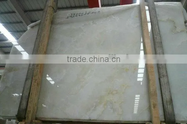 Red Onyx tile wholesaler price