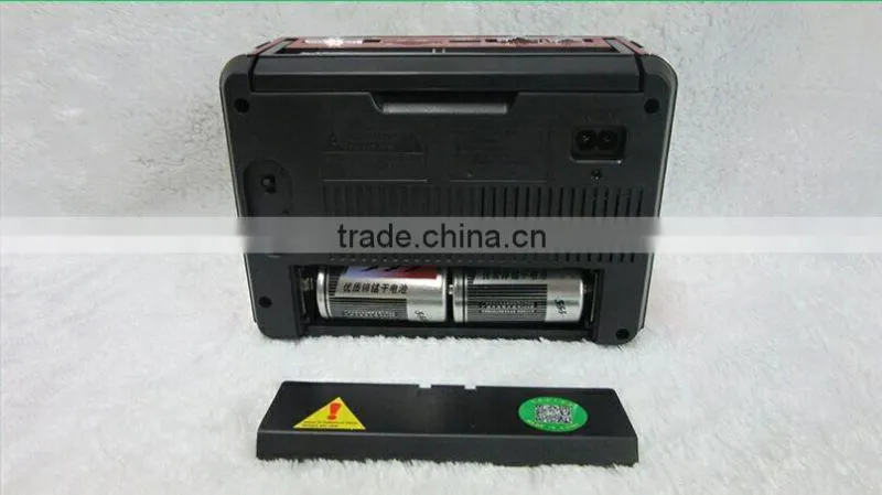 2014 China hot sell factory portable speaker am fm pocket radio with alarm clock