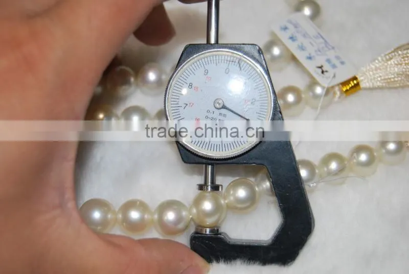 12-13mm AA white round south sea pearl strands