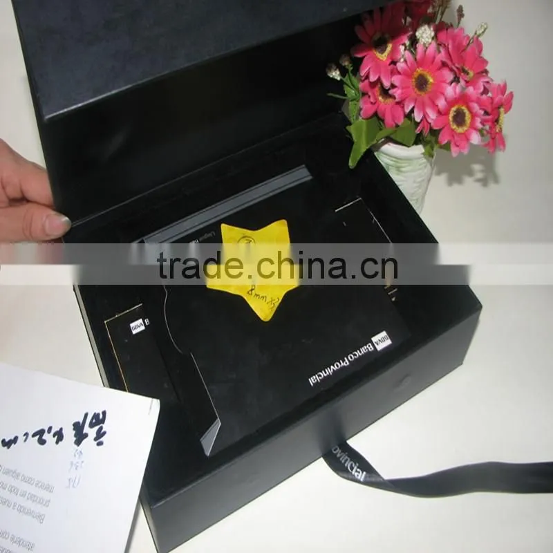 black box with CMYK printing and gold logo lamination and ribbon