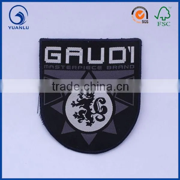 cheap custom sew on embroidery clothing badge