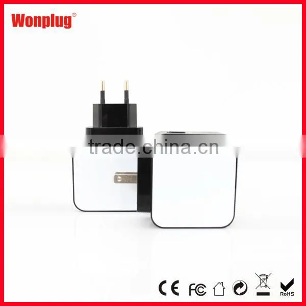 2 port USB multi use mobile phone home charger with 4 interchangeable EU US UK AU plug
