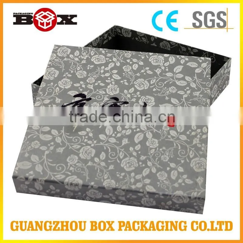 Plain black paper gift box with stamped logo