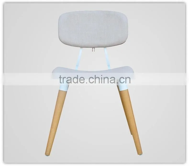 blue fabric upholstered dining room chair with leather