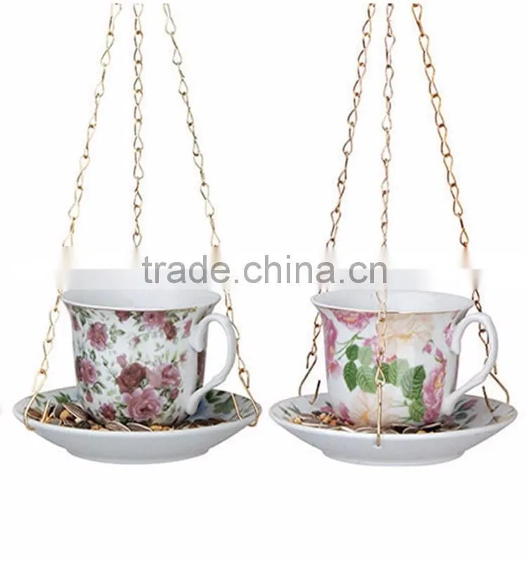 Hanging teacup ceramic bird feeder