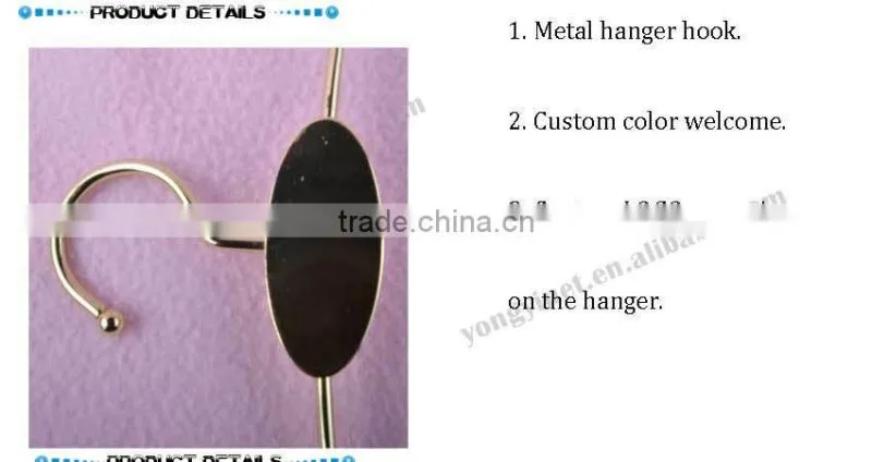 Gold metal hanger with clips for bikini clothes