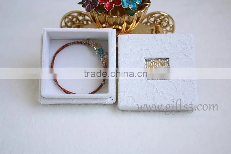 Elegant white wedding jewelry gift boxes with beaded name plate of G