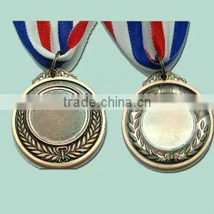 Golden badge/lapel pin/medal with green ribbon