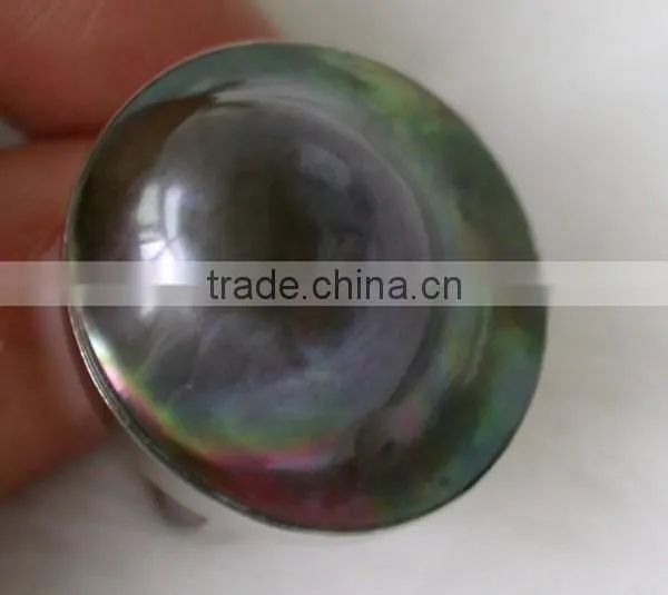 black seawater UFO shaped tihatian pearl ring with gold ring