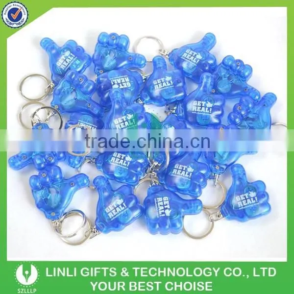 Thumb shape oem logo plastic led keyring light for advertising