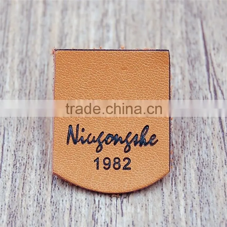 Private embossed yellow logo pu bag shirt label leather