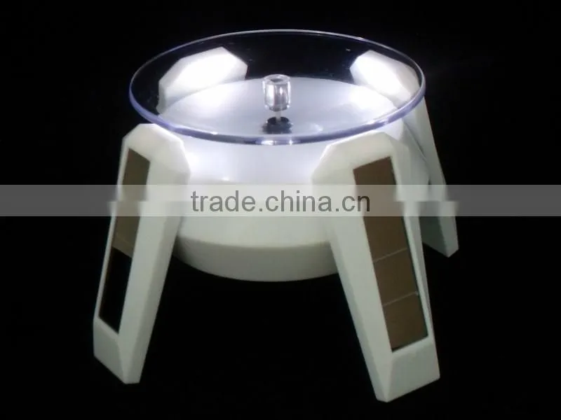 Solar Power Rotating Display Stand With 4 LED Light For Sale