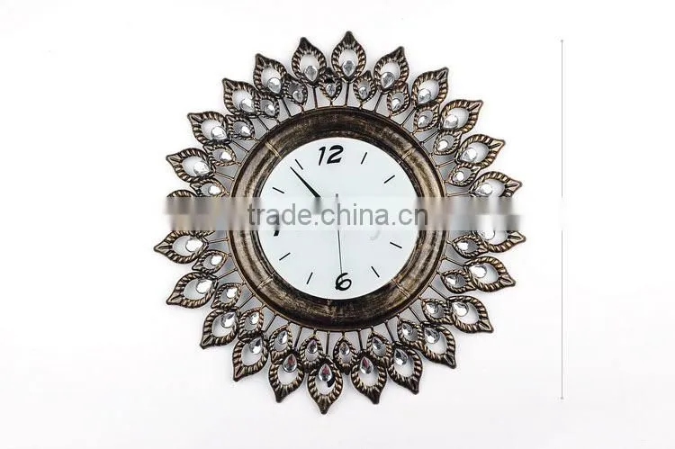 Vintage gold metal wall clock with eye shape