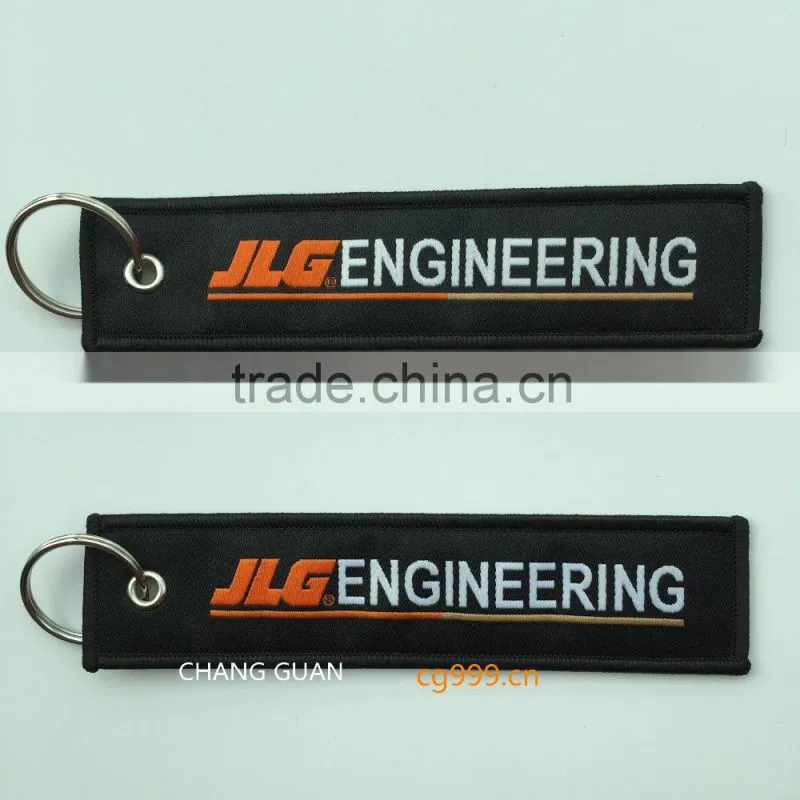 The woven label bag keychain