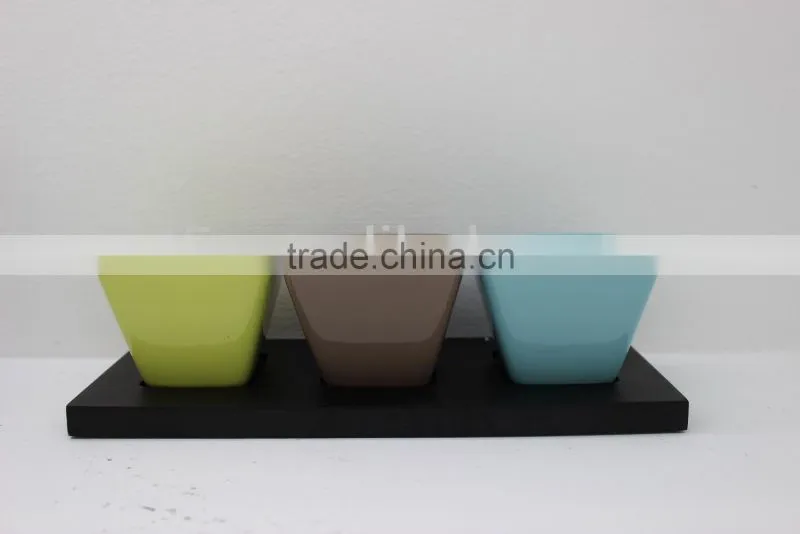 Colorful wooden snack tray with ceramic bowl and stainless steel spoon