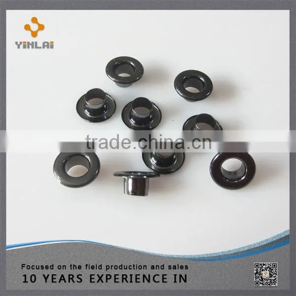 Decorative metal shoe eyelet