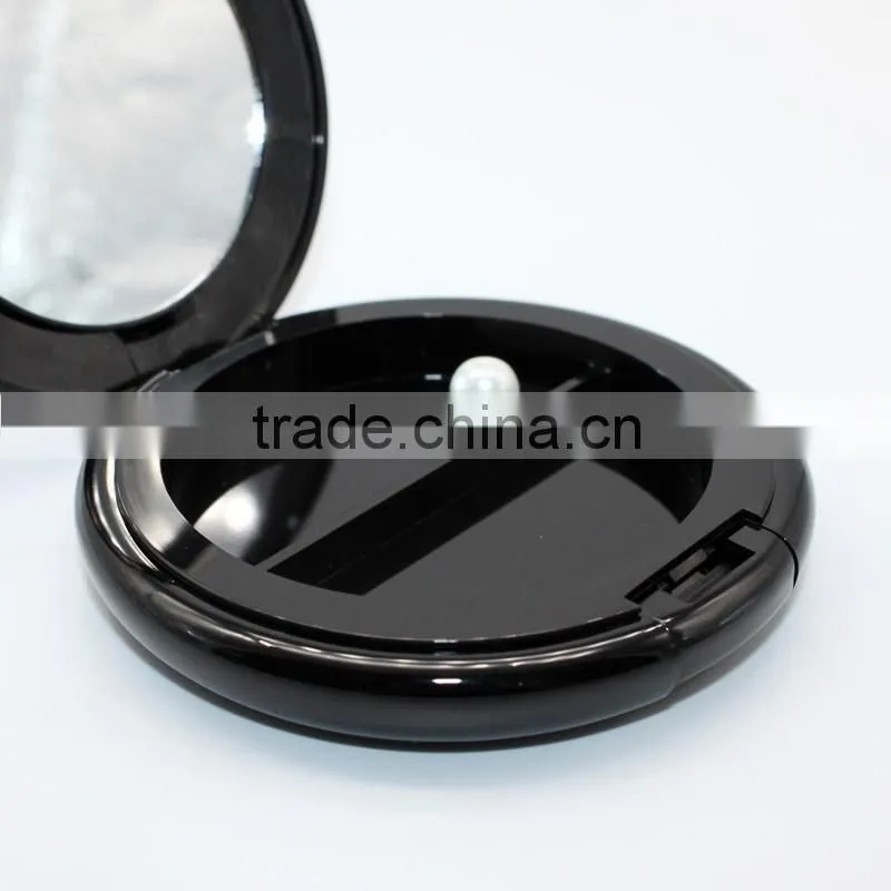Round compact powder container with mirror