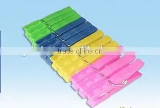 Colour plastic clothes hanging pegs