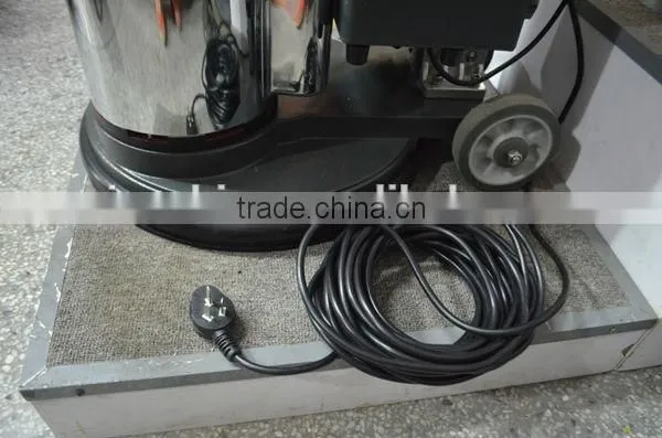 Hand held carpet washing machine