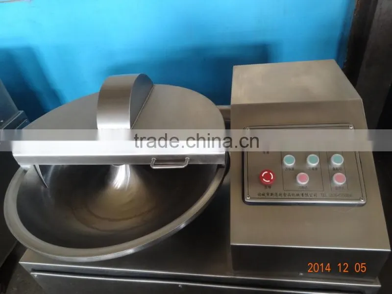 Meat cutting and blending machine
