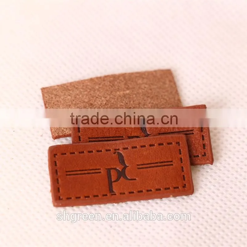 100% true leather label,sewing on leather patch