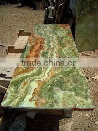 A GRADE DARK GREEN ONYX TABLE TOPS COLLECTION