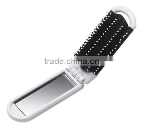 round pocket mirror with comb