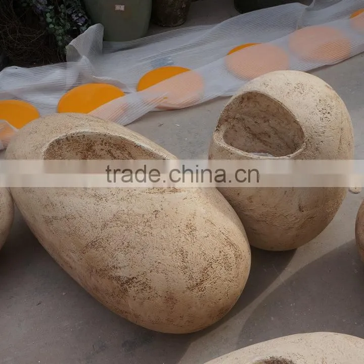 Large stone egg flowerpot