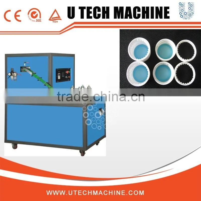 Cap slitting machine for chemical bottle cap