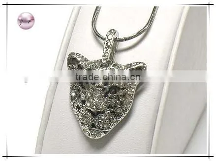 Crystal stud detailed filigree tiger pendant necklace