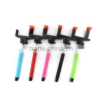 Mini wireless remote shutter for selfie stick on monopod