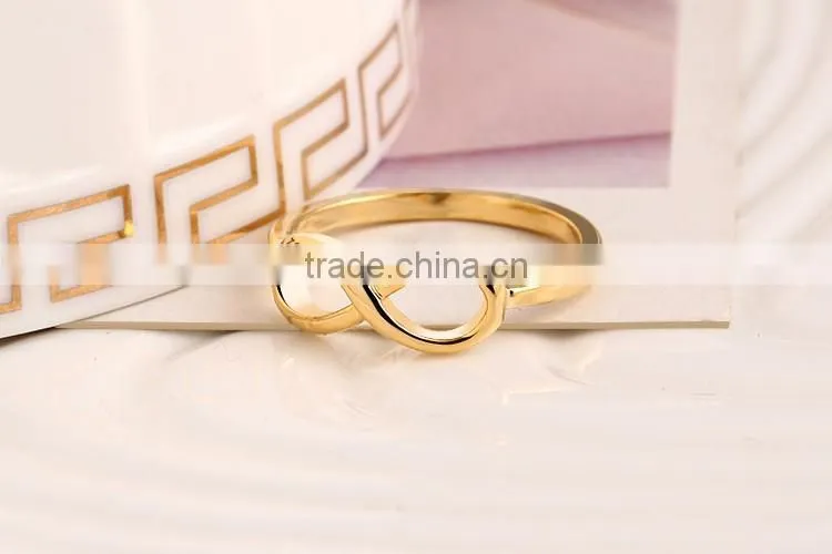 Alloy plated girl's lovely jewelry bowknot rings gold