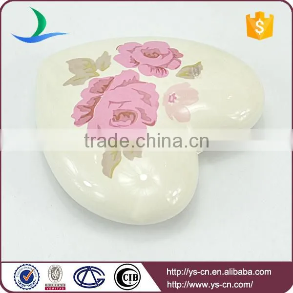 white heart shape hanging with pink flower decal
